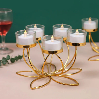 Metal candle holder for romantic table decoration with a retro design.