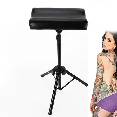 Tattoo Table Station with adjustable height, black cushion, and sturdy tripod base.