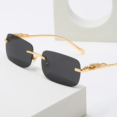 Gold Black Rectangular Sunglasses with metal hinge and rimless design.