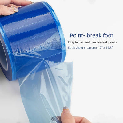 Blue disposable waterproof tattoo barrier film roll being torn, showcasing easy tear design for protective use.
