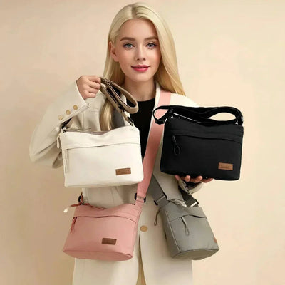 Women's casual nylon crossbody bags with zipper closure in multiple colors.