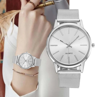 Luxury silver minimalist women's watch with quartz movement, featuring a breathable stainless steel band.