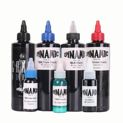 Dynamic Tattoo ink bottles in various colors and sizes.