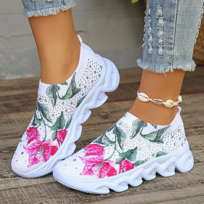 Crystal floral knitted sneakers with floral pattern and slip-on style, featuring mesh upper and rubber outsole.