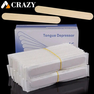 Disposable wooden tongue depressor with paper packaging and box background.