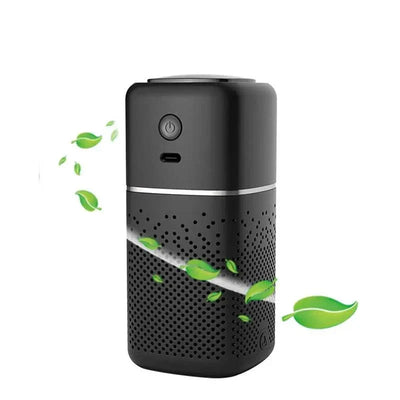 Mini intelligent car air purifier in sleek black design with power button and USB port, releasing fresh green leaves.
