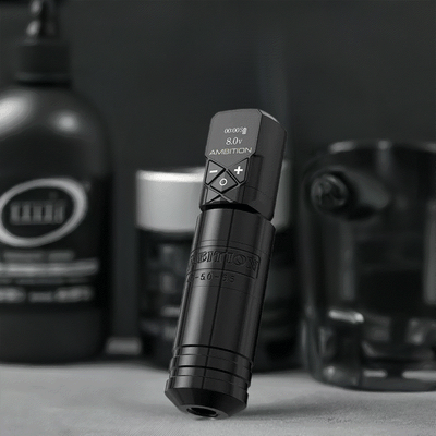 Ambition Torped 36 stroke tattoo gun in black with LCD display, showcasing RCA connection and solid build quality.